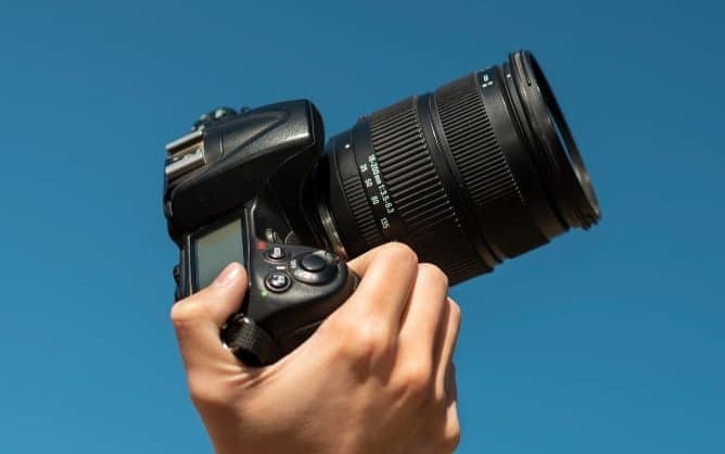 Hand holding camera